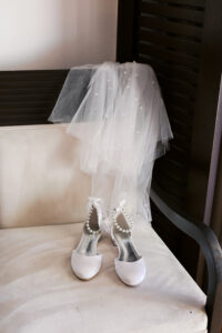 Bridal shoes and pearl veil detail at Hyatt Ziva Cabo San Lucas destination wedding